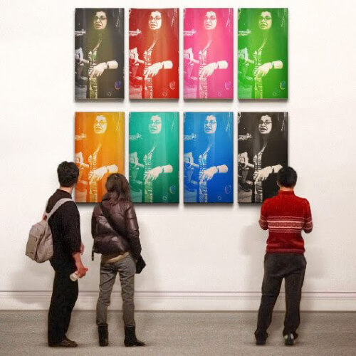 Adrian Leeds as a montage of artwork on a museum wall