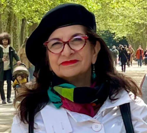 Adrian Leeds dressed warmly in the Luxembourg Gardens in Paris