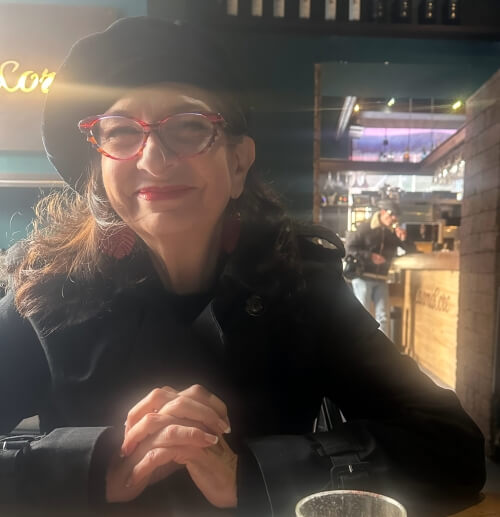 Adrian Leeds at a cafe in Naples, Italy