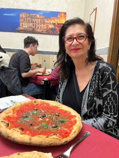 Adrian Leeds eating piazza in Naples, Italy
