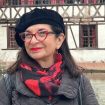 Adrian in a black beret in Strasbourg, France