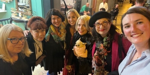 Adrian Leeds with her entire Nice "Dream Team!" From left to right: Patty Sadauskas, Kathy Grassi, Katie Friedland, Katie Archer (AKA "Archer"), Ella Dyer with Simone (our mascot), Adrian and Willow Miller-Cornu (visiting from the U.S.)