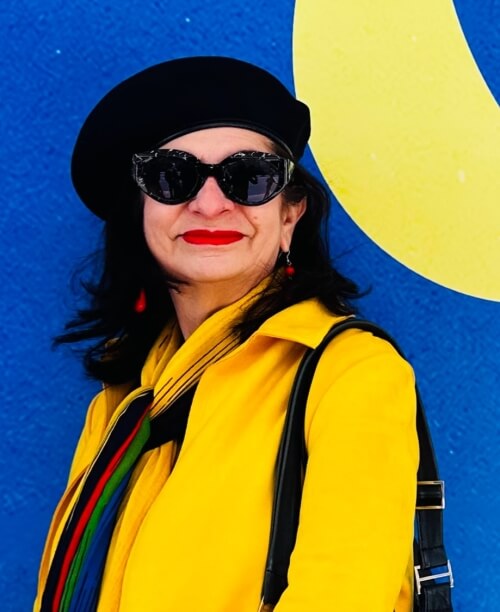 Adrian Leeds dressed in yellow in Paris