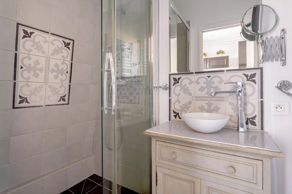custom tiles and renovated bath at 9 rue Lagrange Paris 75005