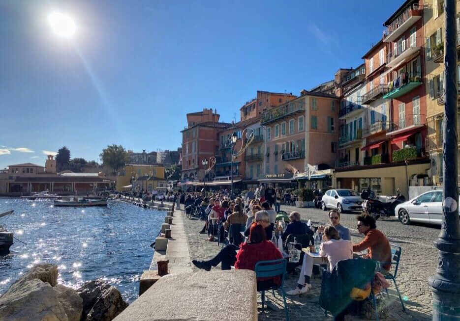 A water-side cafe on a sunny day in Villefranche-sur-Mer