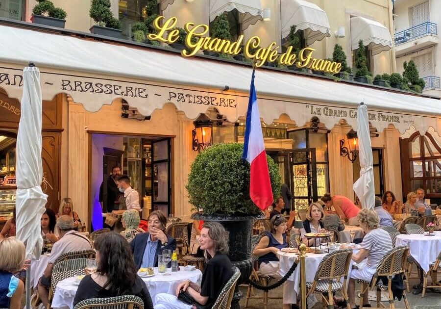 Outdoor seating at Le Grand Cafe de France in Paris
