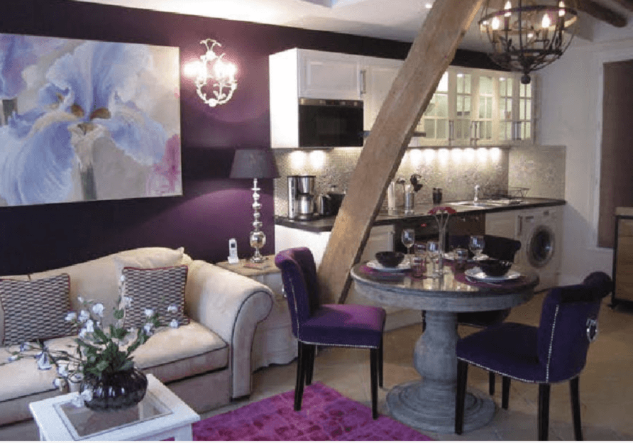 The living room and kitchen in La Fleur de Poitou, apartment for sale in Paris
