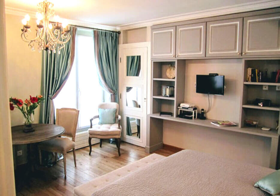 Dining, large window and sitting areaAn apartment for sale in Paris