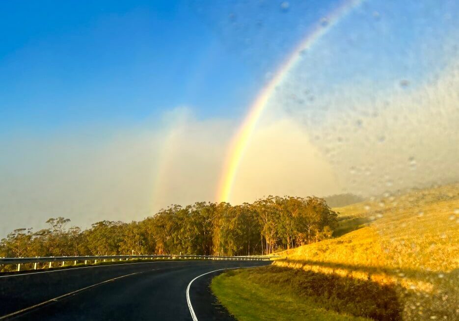 Adrian Leeds sighting a double rainbow in Hawaii