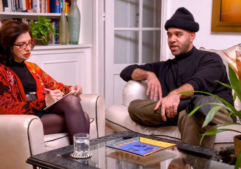 Screenshot of Adrian Leeds with a client for an episode of House Hunters International
