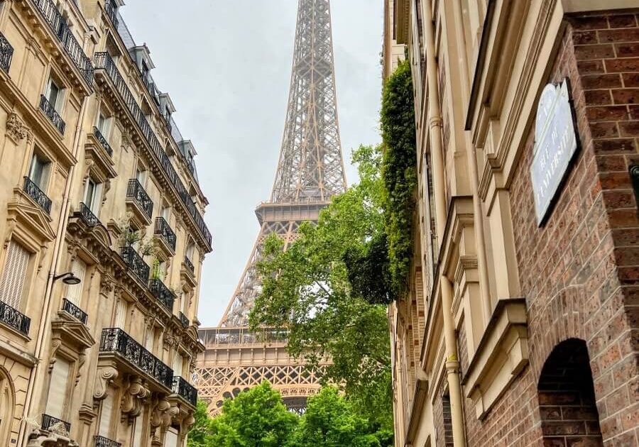 View of the Eiffel Tower down a street in the 7th arrondissement