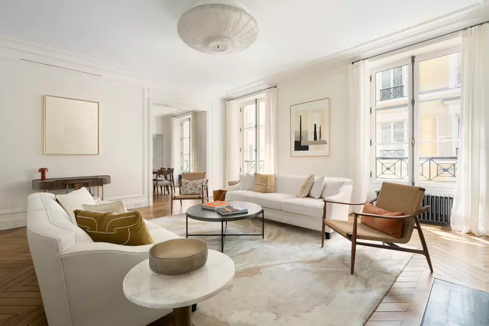 Large bright custom designed living space with windows 2 rue des Beaux Arts