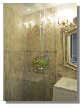 Glass instead of a solid shower enclosure 17-10-13GlasstoSeeThroughEnlargesSpace Le-Petit-Trianon-Paris-Apartment-Rental-3300