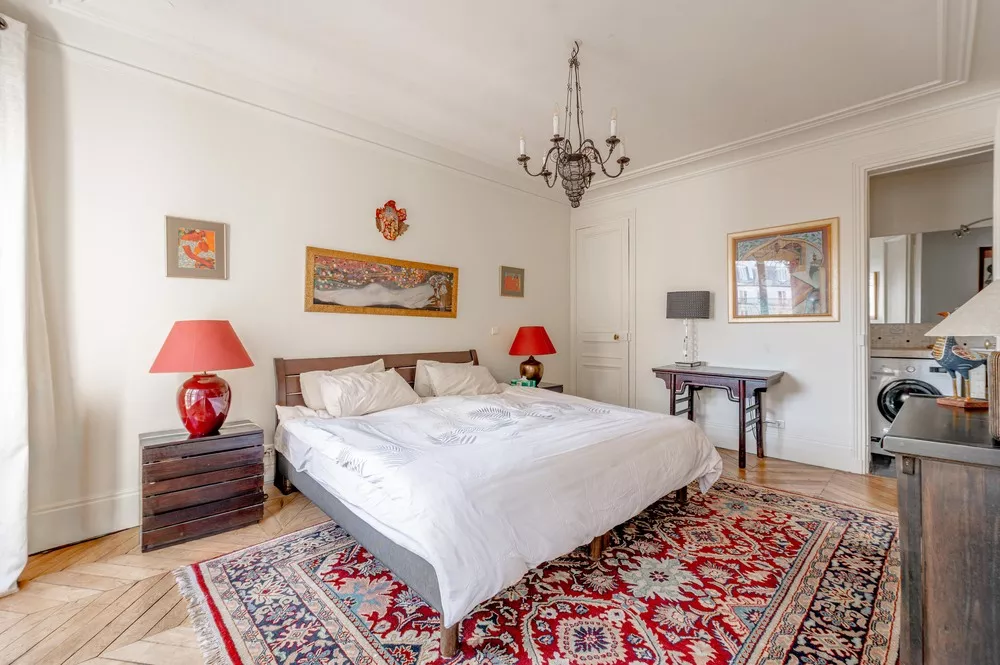 Large main bedroom Rue de Palestro with hardwood ensuite bathroom and storage Paris France