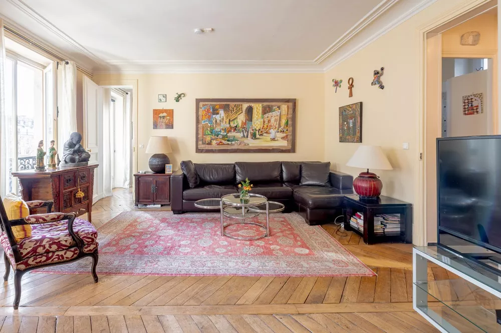Large living area at Rue de Palestro with hardwood fully renovated Paris France