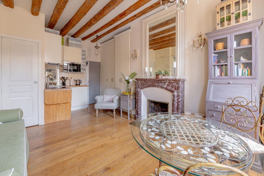View from dining to kitchen and entry at 50 rue Volta Paris